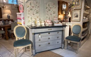 Freshly staged vignette with a new chest and paired chairs