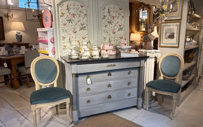 Freshly staged vignette with a new chest and paired chairs
