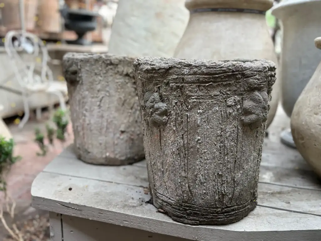 A pair of antique faux bois stump planters from the late-1800s