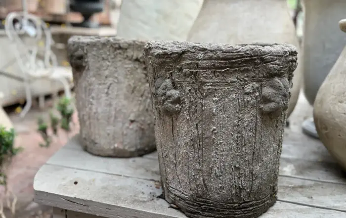 A pair of antique faux bois stump planters from the late-1800s